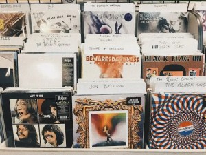 Vinyl records of vintage music on display in a music shop