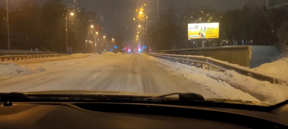 Driving in Lithuania from Vilnius airport in the snow.